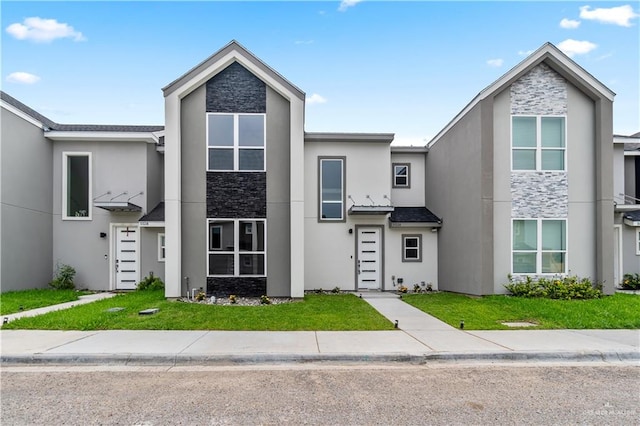 5516 N Crown Pt, Pharr, TX 78577 - view of front of home featuring stone siding and stucco siding