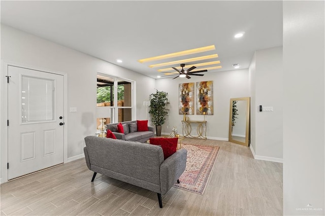 5516 N Crown Pt, Pharr, TX 78577 - kitchen featuring appliances with stainless steel finishes, a barn door, a sink, light wood-type flooring, and tasteful backsplash