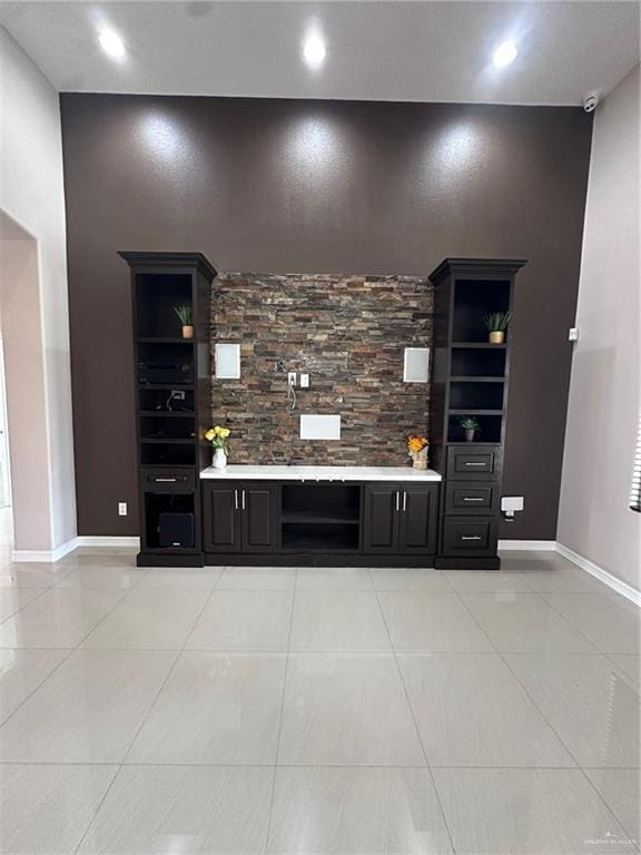 5013 Nevis Dr, Edinburg, TX 78539 - bar with an accent wall, light tile patterned floors, baseboards, and recessed lighting