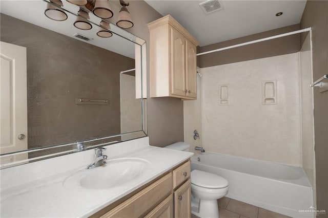 full bathroom featuring vanity, tub / shower combination, tile patterned floors, and toilet