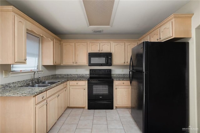 kitchen with light tile patterned flooring, sink, light brown cabinetry, and black appliances