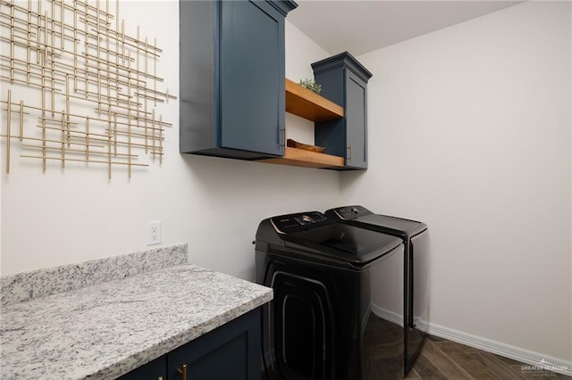 3524 Inez St, Edinburg, TX 78539 - laundry area with cabinet space, washing machine and clothes dryer, and dark wood-style floors