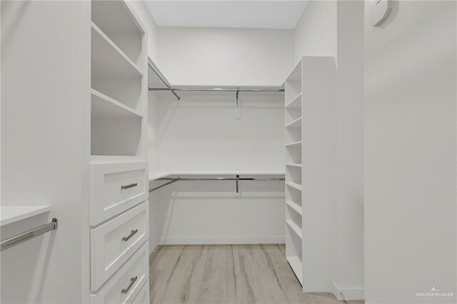1007 Broken Arrow Dr, Alamo, TX 78516 - spacious closet featuring light wood finished floors