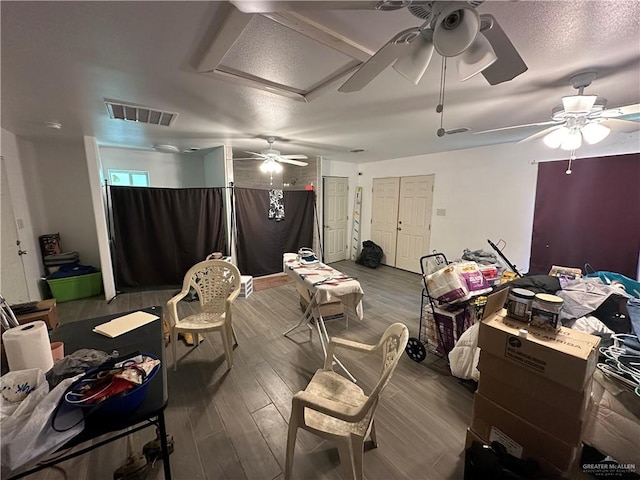 interior space featuring hardwood / wood-style flooring and ceiling fan