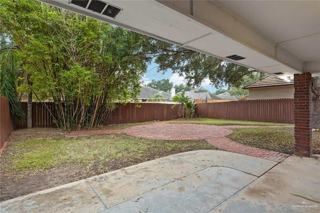 view of yard featuring a patio