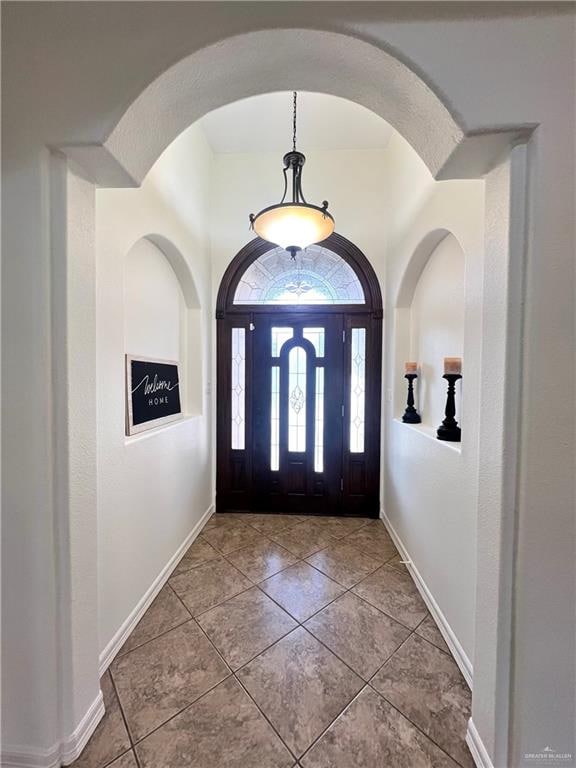 view of tiled foyer entrance