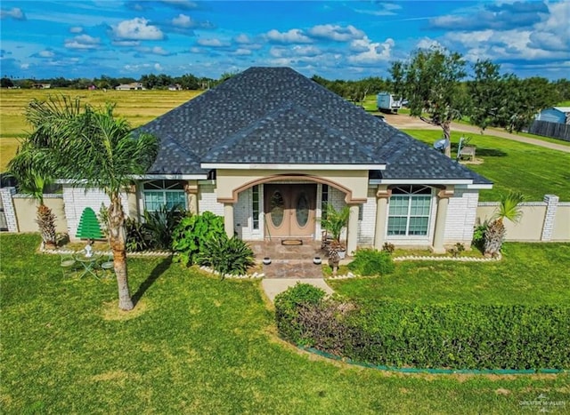 2209 Benito A Ramirez Rd, Edinburg, TX 78542 - single story home with brick siding and a shingled roof