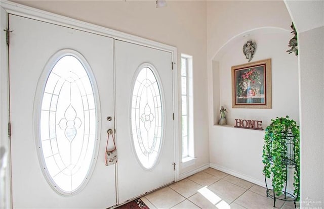 2209 Benito A Ramirez Rd, Edinburg, TX 78542 - entryway with light tile patterned flooring and healthy amount of natural light
