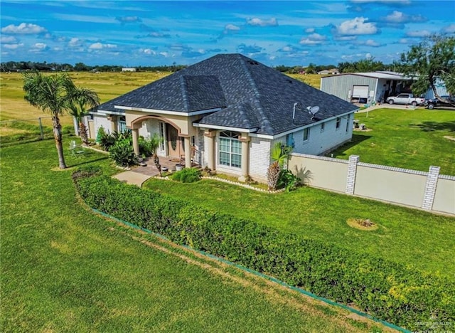 2209 Benito A Ramirez Rd, Edinburg, TX 78542 - view of front of house featuring a shingled roof