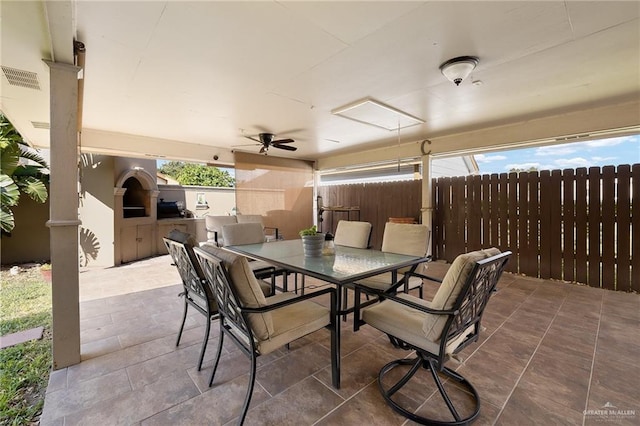 view of patio / terrace featuring ceiling fan