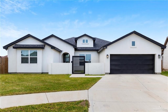 7423 Converse Lk, Brownsville, TX 78520 - view of front facade featuring an attached garage, concrete driveway, a shingled roof, and stucco siding