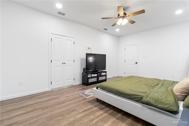 7423 Converse Lk, Brownsville, TX 78520 - bedroom with wood finished floors, baseboards, recessed lighting, a closet, and ceiling fan