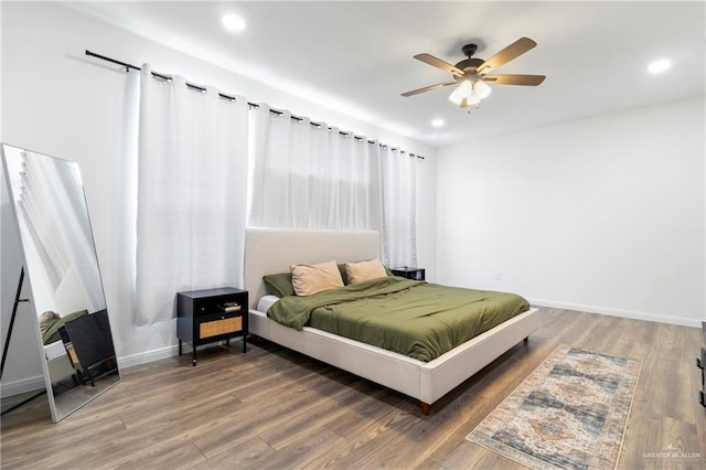 7423 Converse Lk, Brownsville, TX 78520 - bedroom with wood finished floors, recessed lighting, baseboards, and a ceiling fan