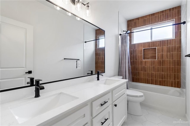 7423 Converse Lk, Brownsville, TX 78520 - full bath with toilet, double vanity, shower / tub combo with curtain, and tile patterned flooring