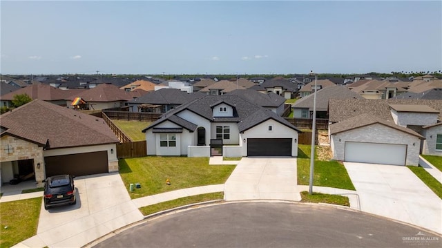7423 Converse Lk, Brownsville, TX 78520 - view of front facade with a residential view, driveway, a garage, and stucco siding