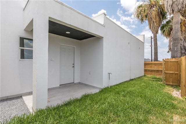 1712 B St, Mission, TX 78572 - doorway to property with stucco siding