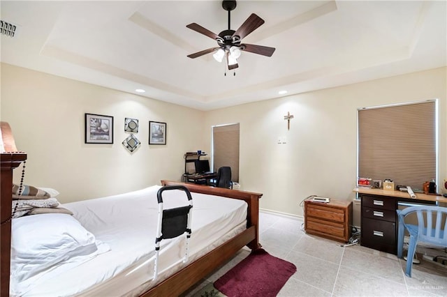 2017 Stonebriar Rd, Harlingen, TX 78552 - bedroom with a tray ceiling, a desk, recessed lighting, and light tile patterned flooring