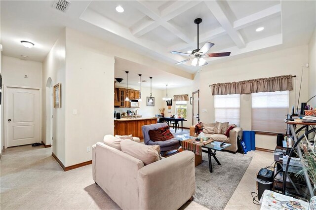 2017 Stonebriar Rd, Harlingen, TX 78552 - living area with coffered ceiling, beamed ceiling, a ceiling fan, recessed lighting, and light tile patterned flooring