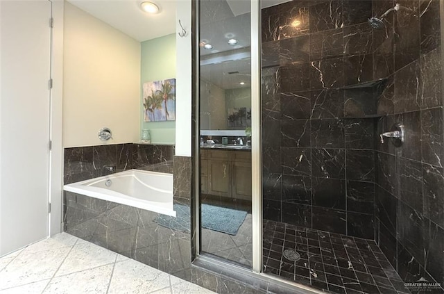 bathroom with a garden tub, vanity, recessed lighting, and tiled shower