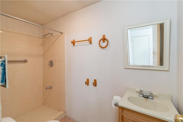 2512 Dallas Ave, Mcallen, TX 78501 - full bath featuring toilet, vanity, and a tile shower