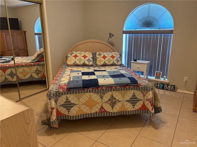 bedroom featuring tile patterned floors