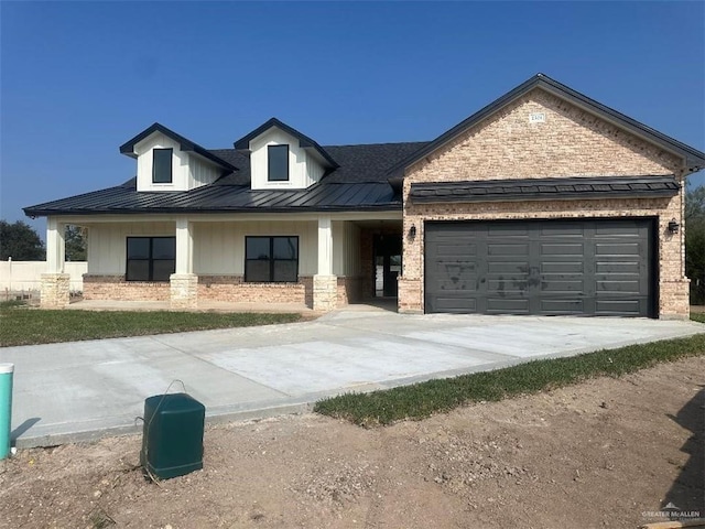 view of front of property with a garage