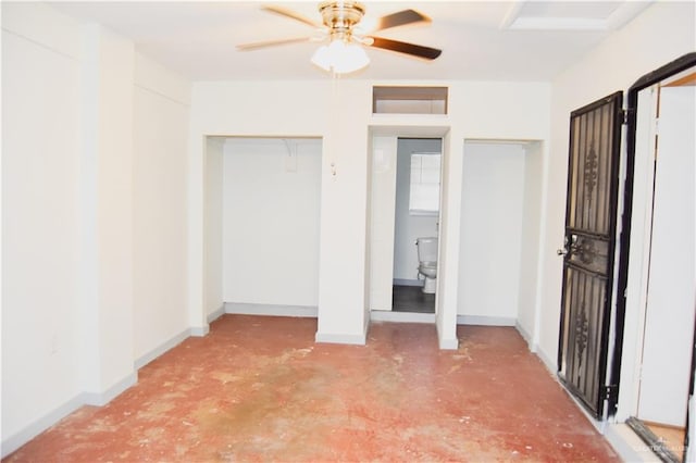 unfurnished bedroom featuring ceiling fan