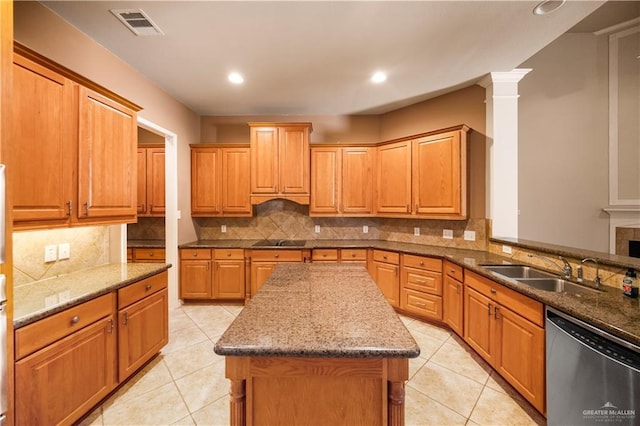 kitchen with black electric cooktop, stainless steel dishwasher, a sink, visible vents, and light tile patterned floors