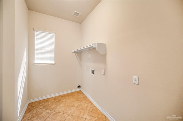 laundry room featuring laundry area, visible vents, baseboards, electric dryer hookup, and washer hookup