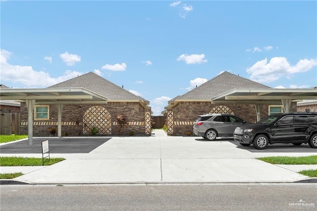 exterior space with a carport