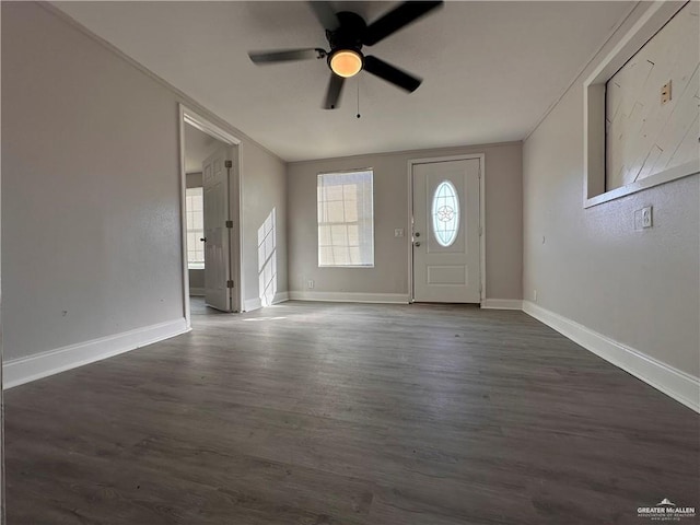 foyer entrance featuring ceiling fan and dark hardwood / wood-style flooring