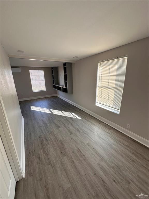 interior space with dark hardwood / wood-style floors