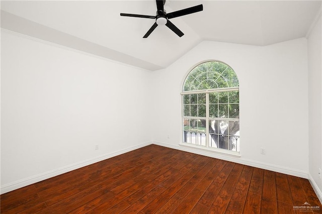 unfurnished room with ceiling fan, hardwood / wood-style floors, and lofted ceiling