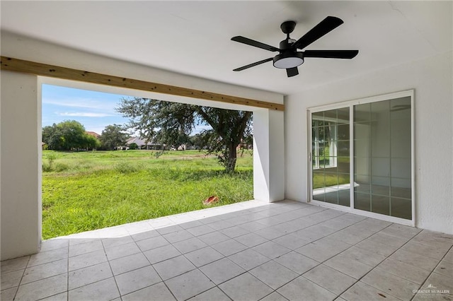 view of patio featuring ceiling fan