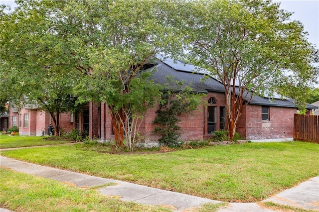 view of front of home with a front lawn