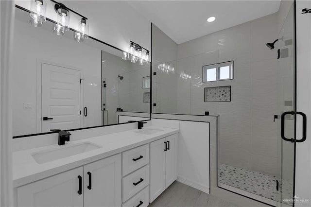 bathroom featuring vanity and walk in shower