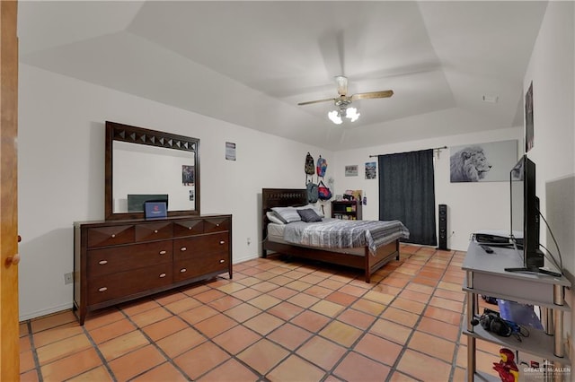 tiled bedroom with ceiling fan