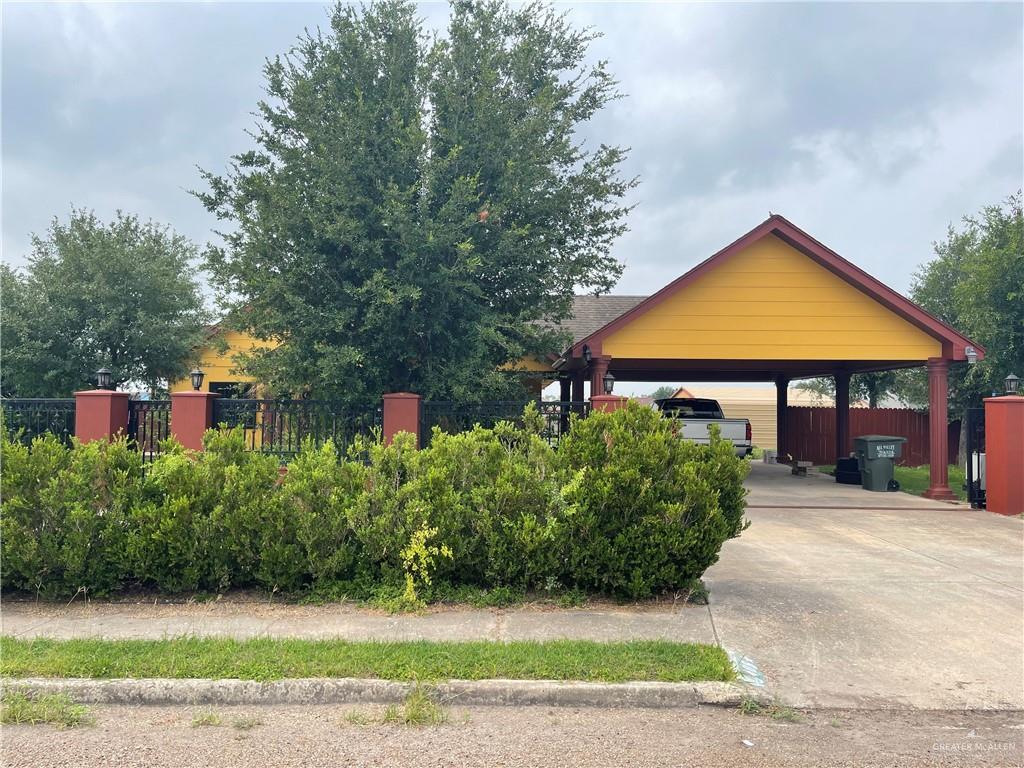 405 Lucas Ct, Alamo, TX 78516 - surrounding community with a carport and driveway