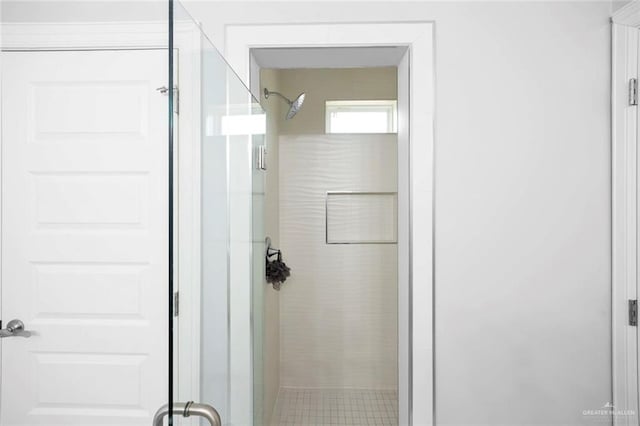 bathroom featuring an enclosed shower