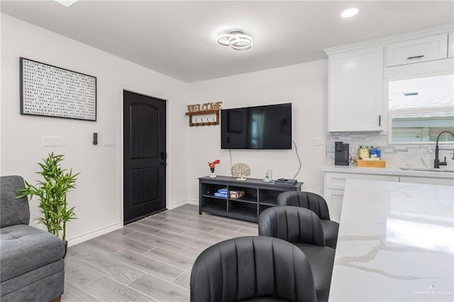 living room featuring sink