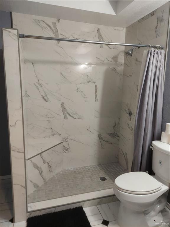 115 Breyfogle Rd, Palmview, TX 78572 - bathroom featuring marble finish floors, toilet, and a marble finish shower