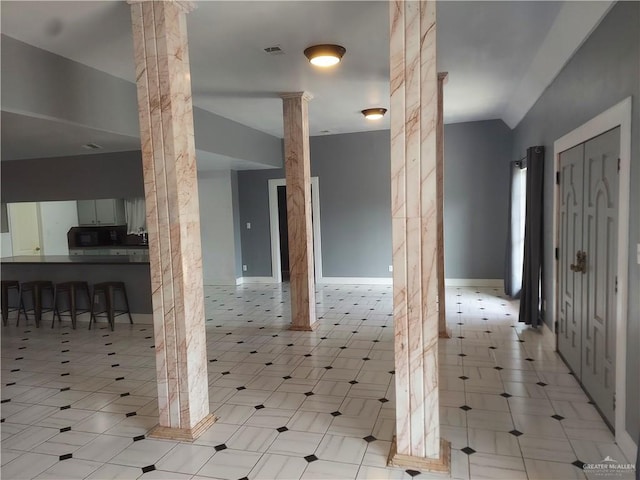 interior space featuring ornate columns