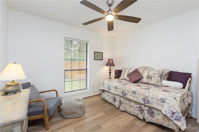 bedroom featuring light hardwood / wood-style floors and ceiling fan