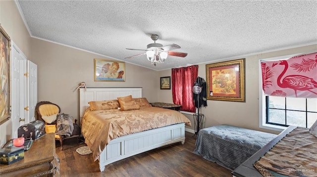 bedroom with ceiling fan, dark wood-type flooring, crown molding, lofted ceiling, and a textured ceiling