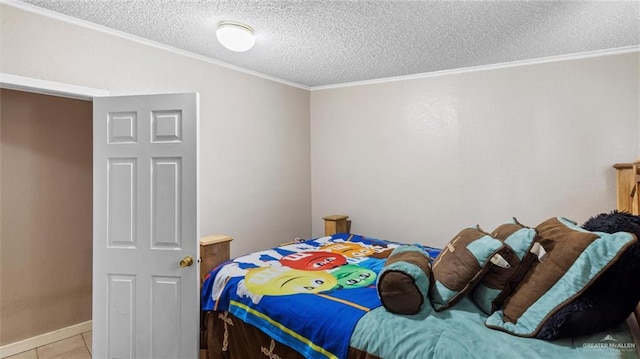 tiled bedroom with a textured ceiling and ornamental molding