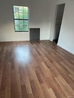 unfurnished room featuring wood finished floors