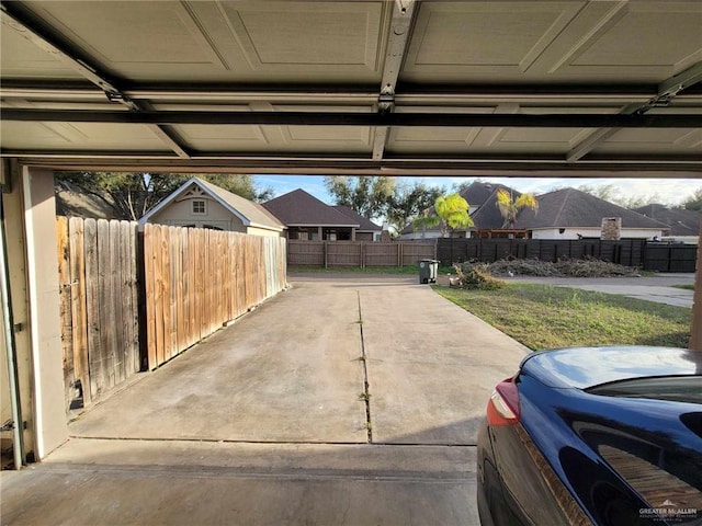 garage with fence