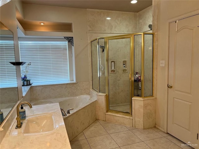 bathroom with tile patterned floors, vanity, and plus walk in shower