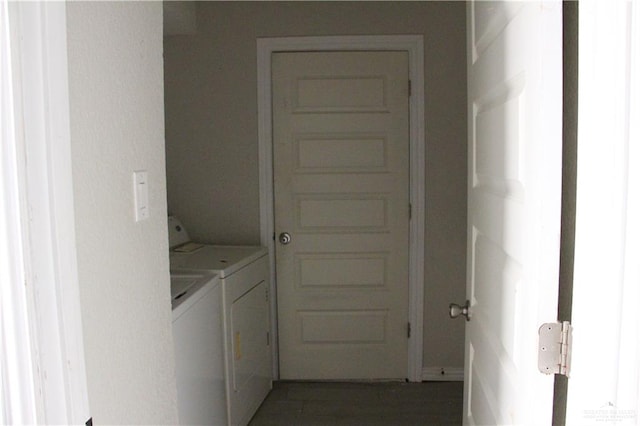 laundry area with washing machine and clothes dryer