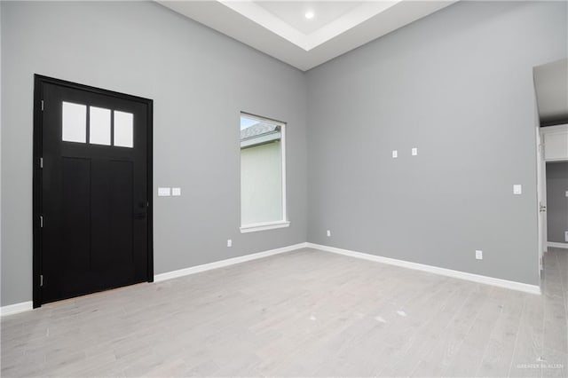 entrance foyer featuring plenty of natural light and light wood-type flooring